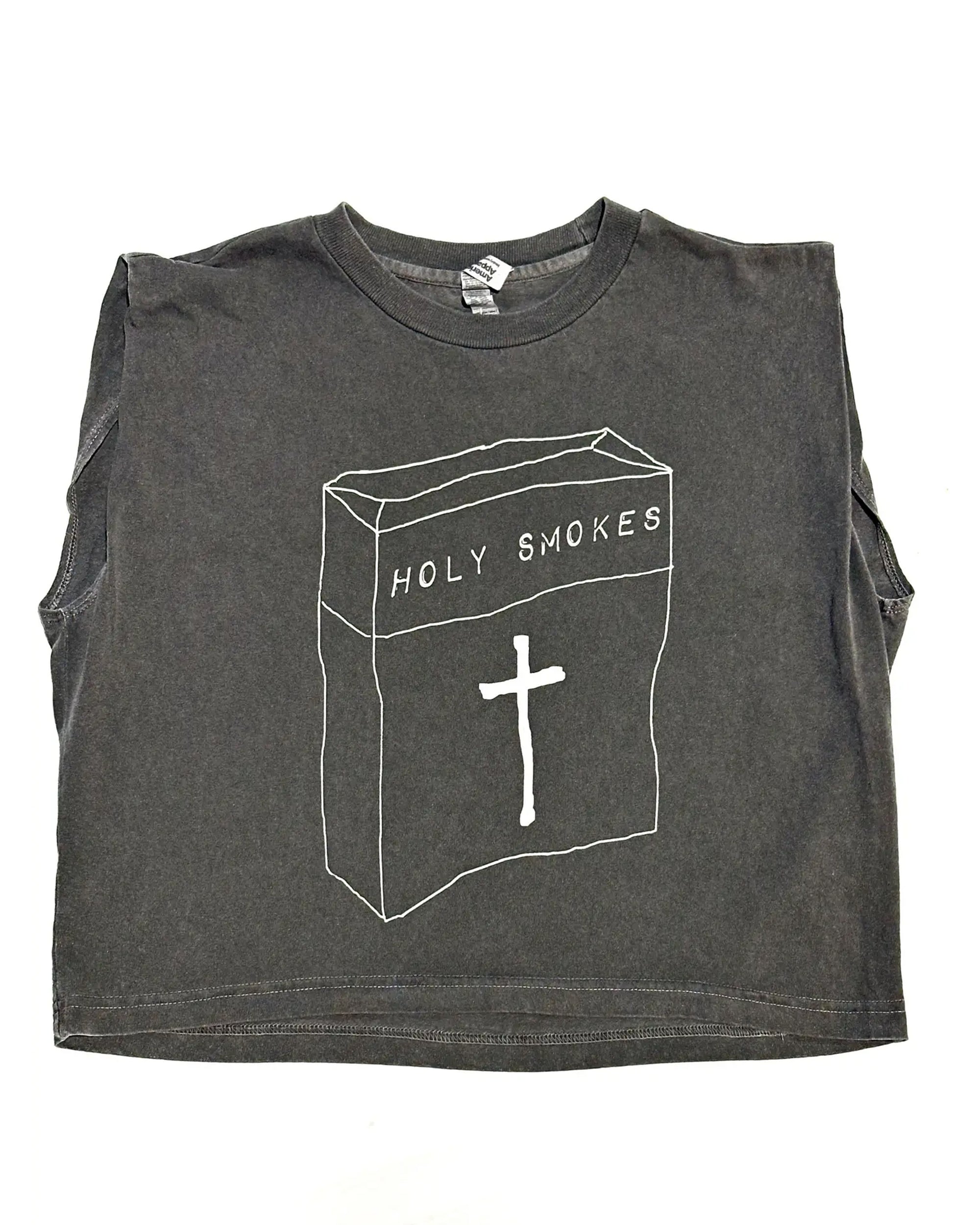The Holy Smokes Crop Top Muscle Tank by Faire is a black 100% cotton top with a white line drawing of a cigarette pack labeled "HOLY SMOKES" and a cross, shown on a plain white background.