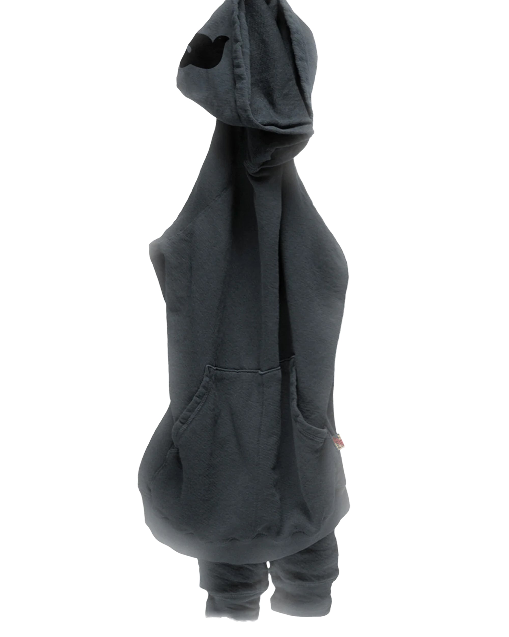 A BASIC GOODNESS HOODIE by Free City (sparrow, LLC), unisex pullover in dark gray, hangs with its hood up and sleeves down. The soft, slightly wrinkled fabric enhances its casual charm. Made in USA.