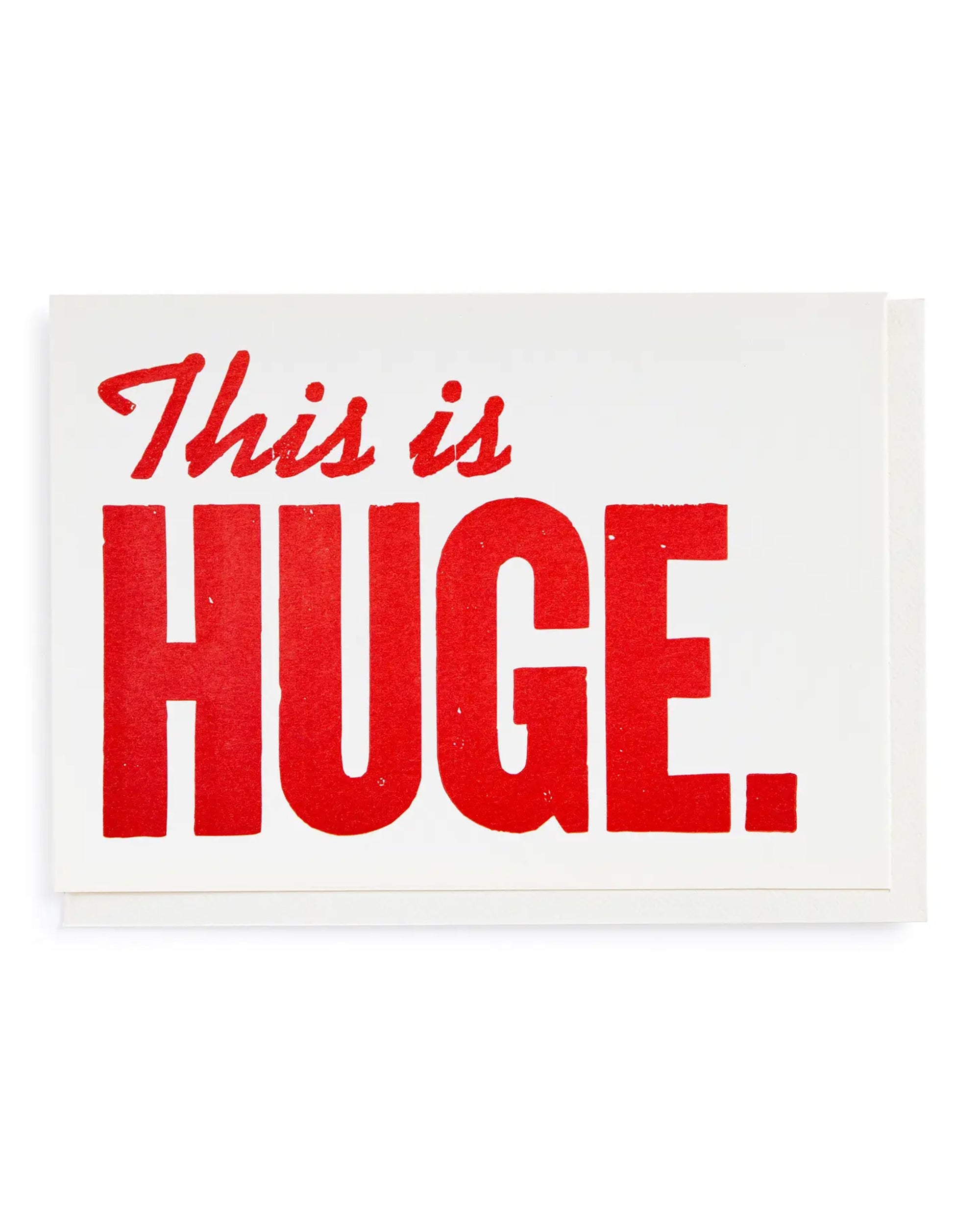The Faire "This is Huge Card" is a white letterpress greetings card with "This is" in handwritten font and "HUGE." in bold red type, creating a striking statement.