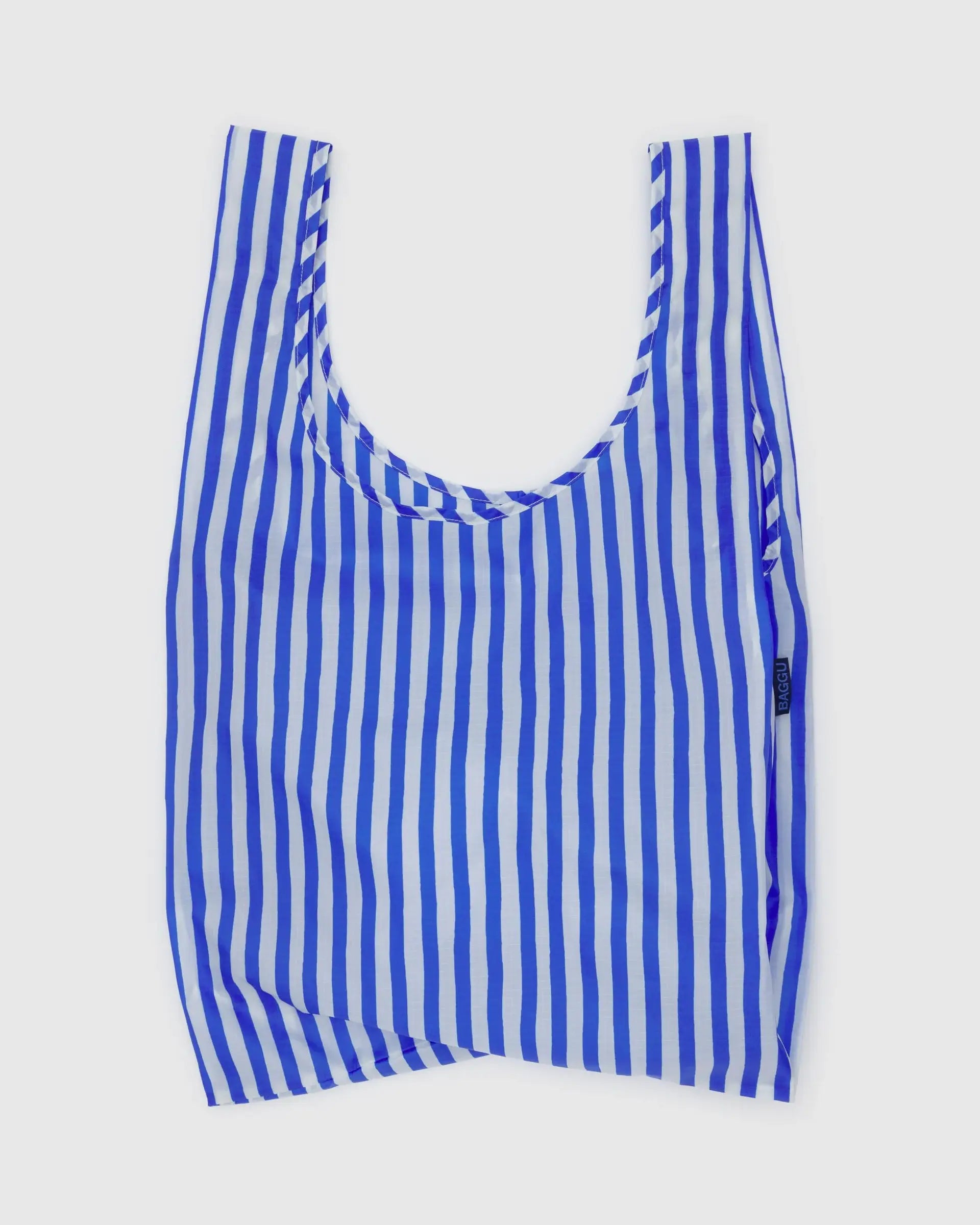 The Baggu Standard by Baggu is a reusable bag made from recycled ripstop nylon with vertical blue and white stripes, shown flat on a plain white background.