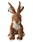 The Faire Jackalope Stuffed Animal features soft brown and white fur, large upright ears with black tips, and wide eyes—a charming, cuddly plush toy photographed against a plain white background.