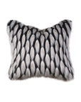 The JADIS ONYX pillow by Eastern Accents is a rectangular decorative accent, featuring soft, fluffy faux fur in a black and white animal-inspired spotted pattern for a chic, luxurious touch to any room.