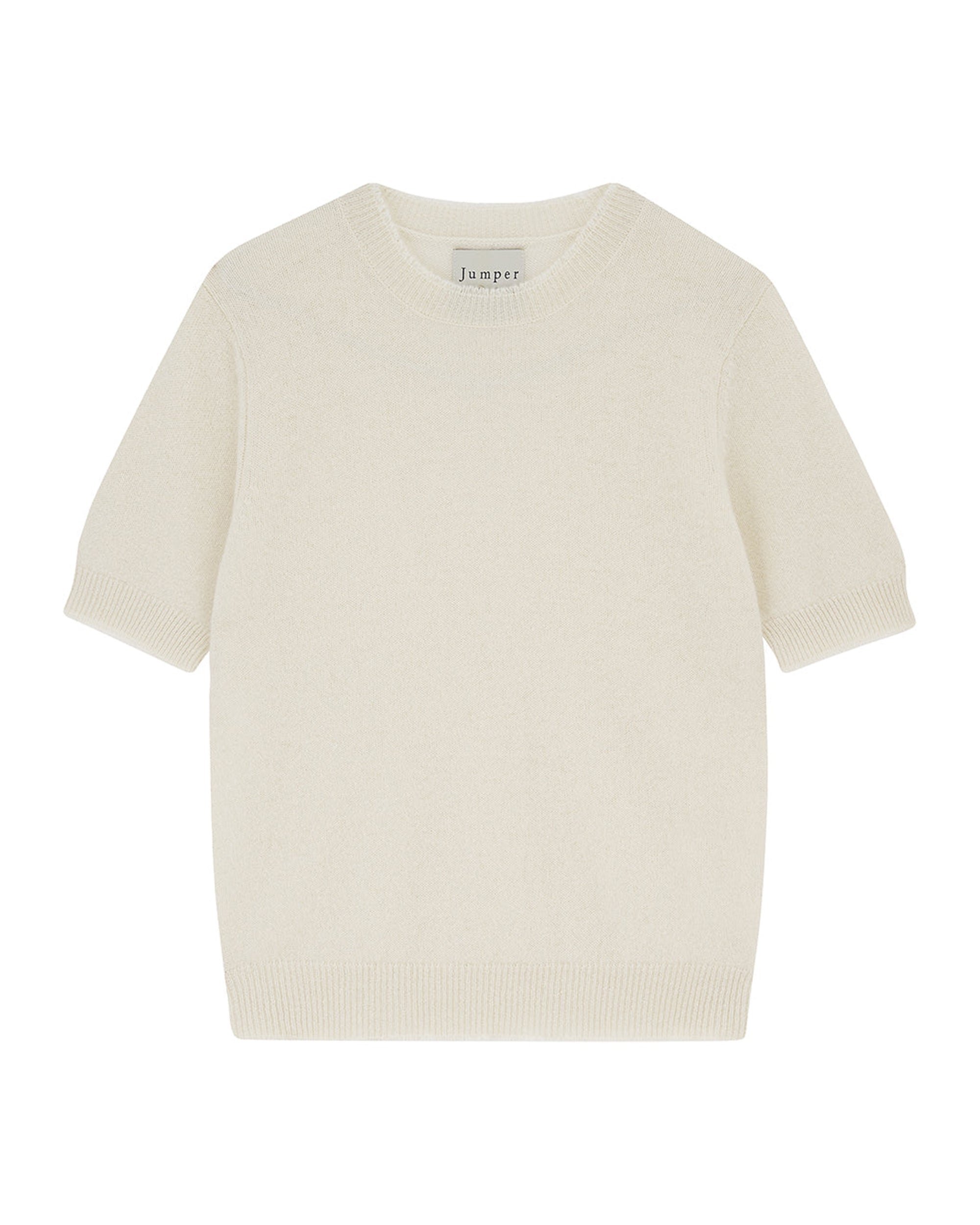 A short-sleeved, off-white Distressed T-Shirt by Jumper 1 2 3 4/CR2, featuring a crew neck with ribbed cuffs and hem, from the core collection, laid flat on a white background. A small tag inside the collar reads "Jumper.