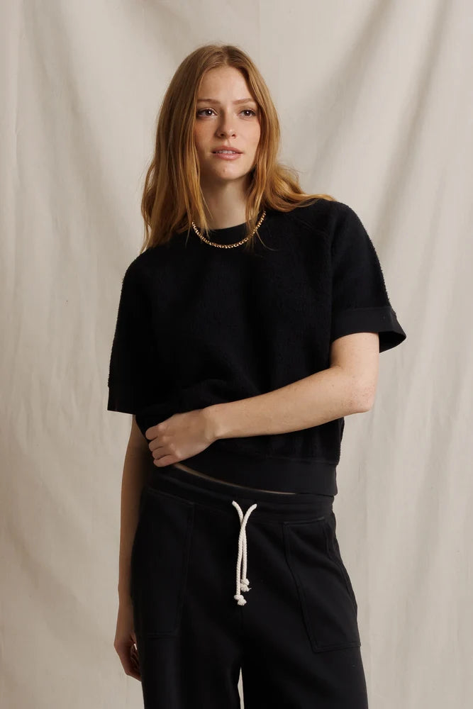Perfectwhitetee Kennedy SS Crew Sweatshirt and drawstring pants in beige, modeled in a neutral studio setting.