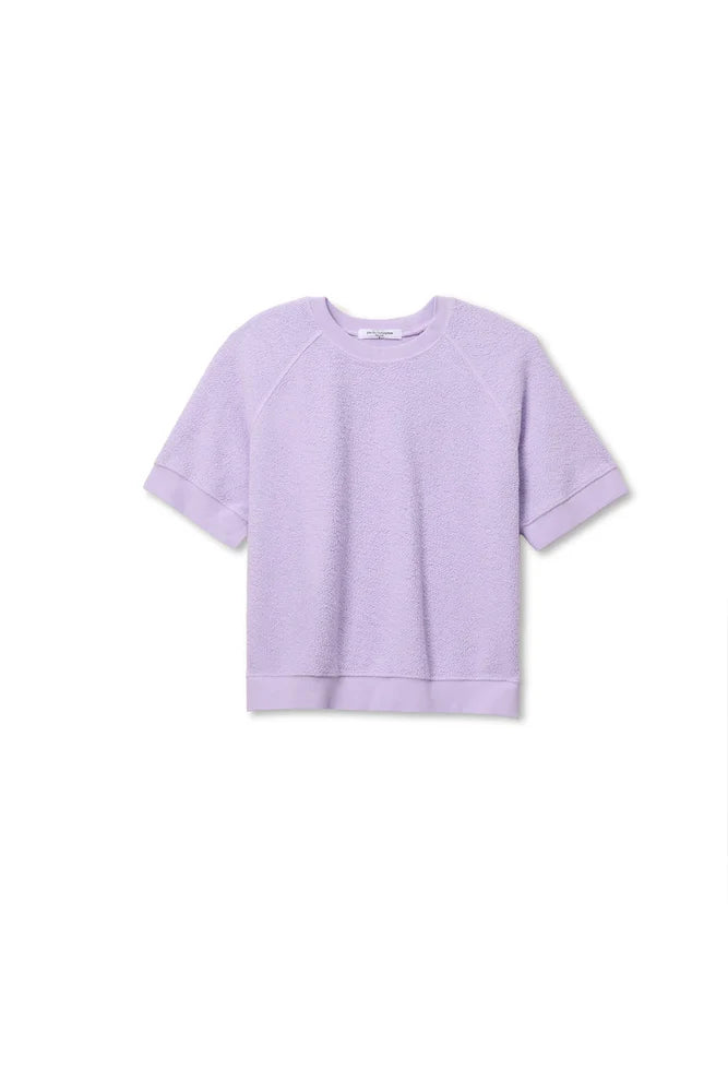 The Kennedy SS Crew Sweatshirt by Perfectwhitetee is a relaxed fit, short sleeve, light lavender crew neck with ribbed cuffs and hem, shown flat on a white background.