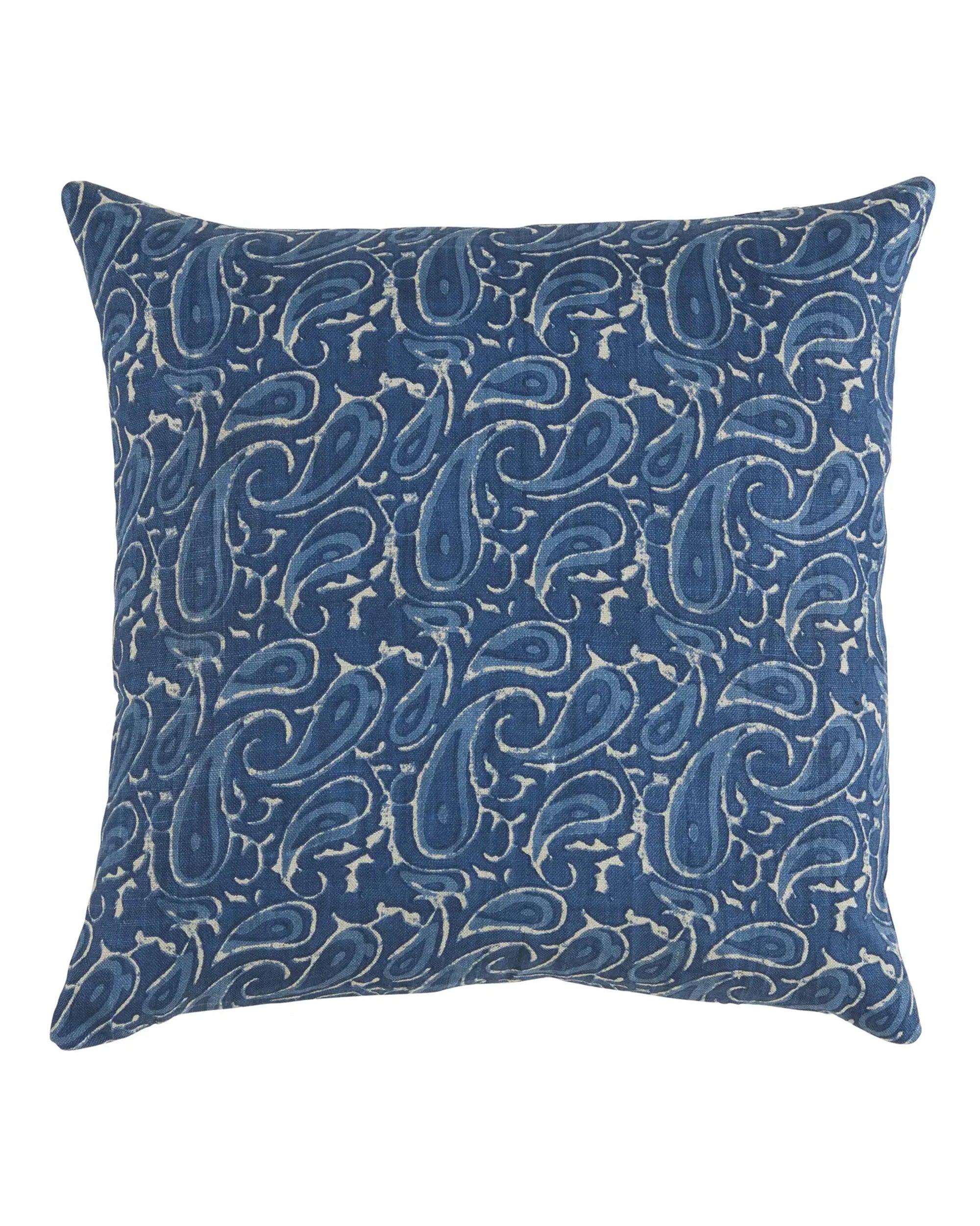 Blue pillow with white paisley pattern by Faire Keri, 22x22 inches, shown on a white background.