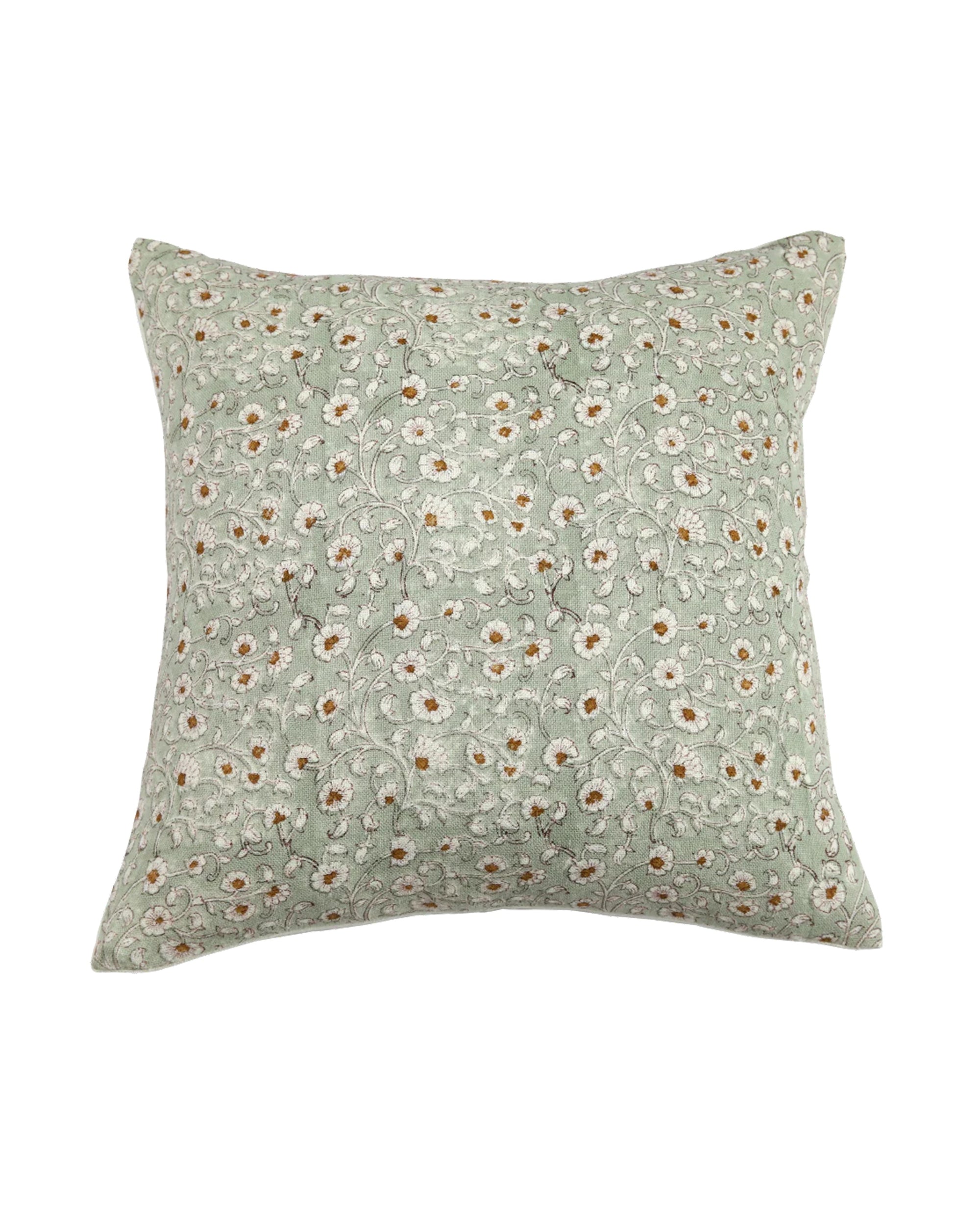 The Keya Mustard Pillow 24x24 by Filling Spaces LLC is a square linen pillow with a hand block-printed floral design in white and brown, green leaves, and a light green background, displayed against a white backdrop.