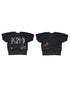 Black cropped sweatshirt with colorful Kiss logos and patches by Made Worn for a bold rock-inspired look.