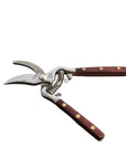 The Faire Thai Kitchen Garden Shears feature stainless steel blades, a spring mechanism, and wooden handles with brass rivets, shown against a white background.