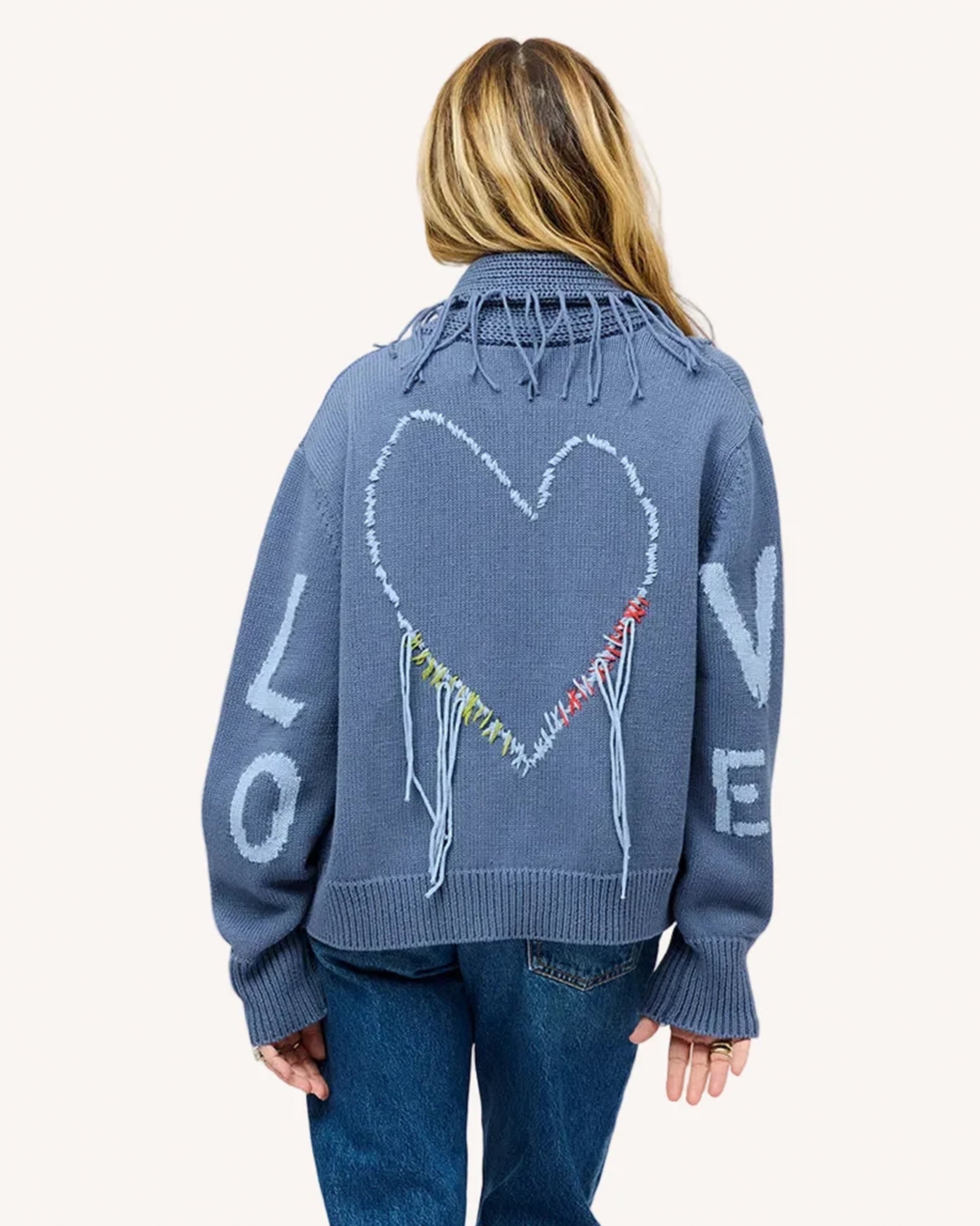 Kerri Rosenthal Love Cardigan with shawl collar, fringe trim, heart and LOVE text on back.