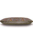 The RUDY PAISLEY throw pillow by Eastern Accents features a brown, leather-like base and a red, blue, and gold paisley top—shown side view against white—ideal for bringing traditional style to your space.