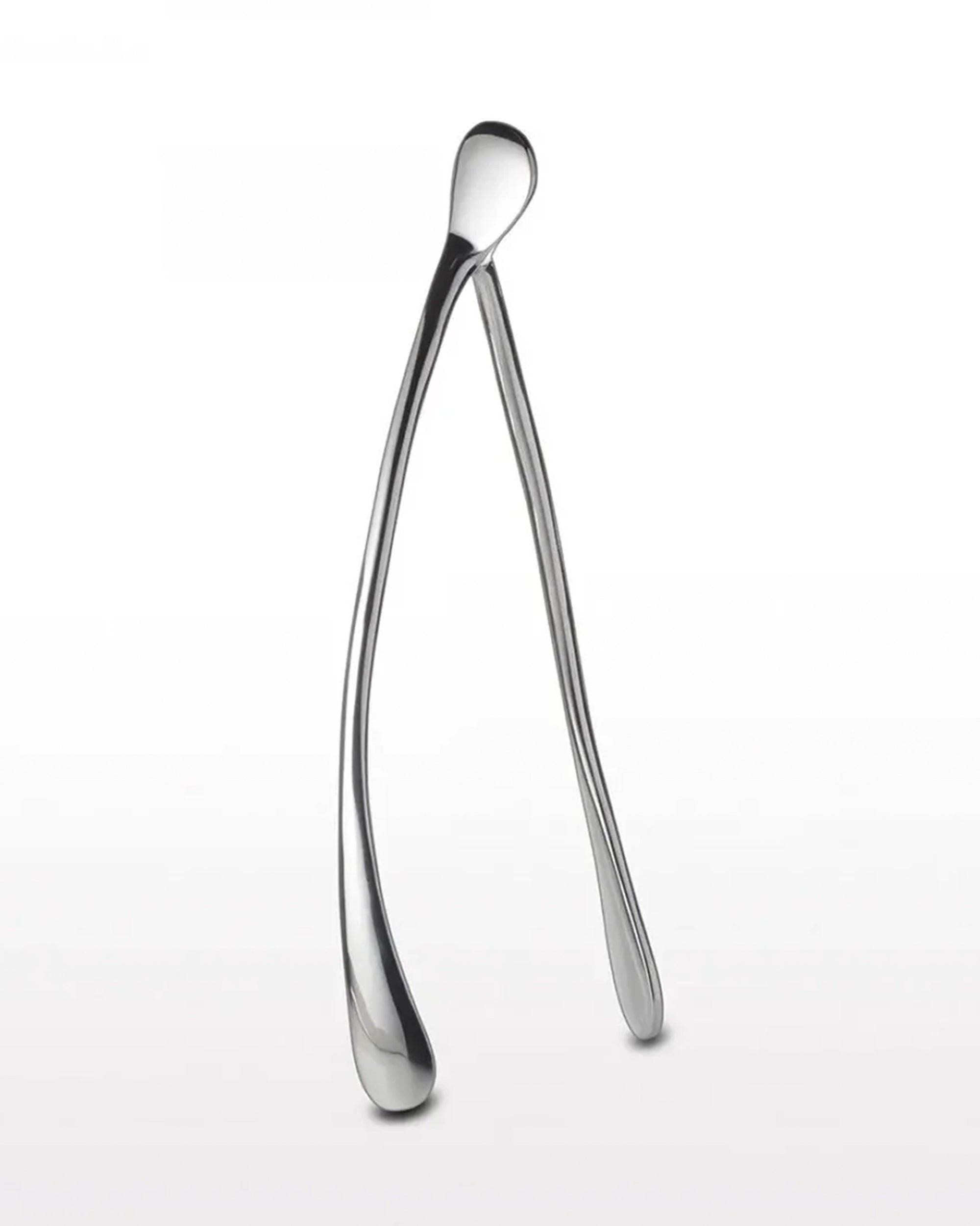 The Faire Wishbone /Large is a shiny, silver wishbone-shaped decor piece crafted from sand cast aluminum with smooth, rounded ends—an elegant handcrafted gift that stands upright on any surface.