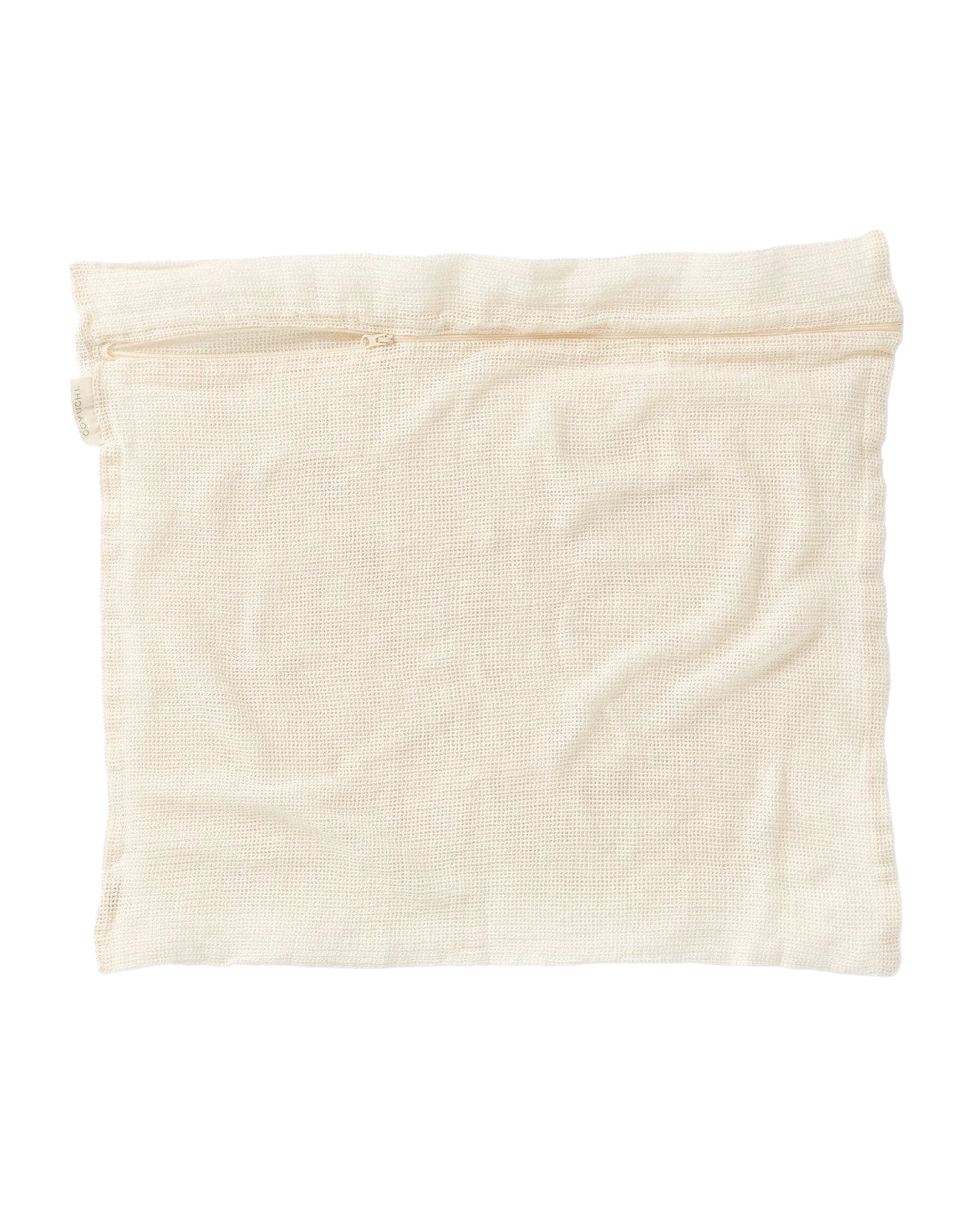 The Coyuchi Inc Organic Laundry Bag XL is a rectangular, off-white organic cotton mesh bag with a top zipper, shown lying flat on a white background.
