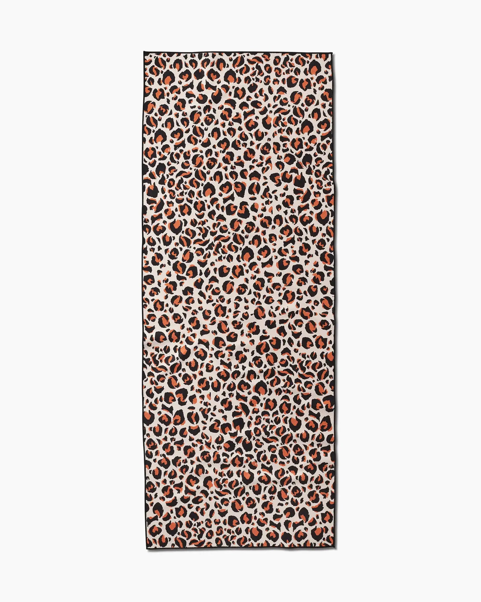 The Faire Leopard Yoga Towel features a rectangular design with an orange, brown, and black leopard print on a light background and a thin black border. Made from ultra-absorbent material, it combines style and comfort for your yoga sessions.
