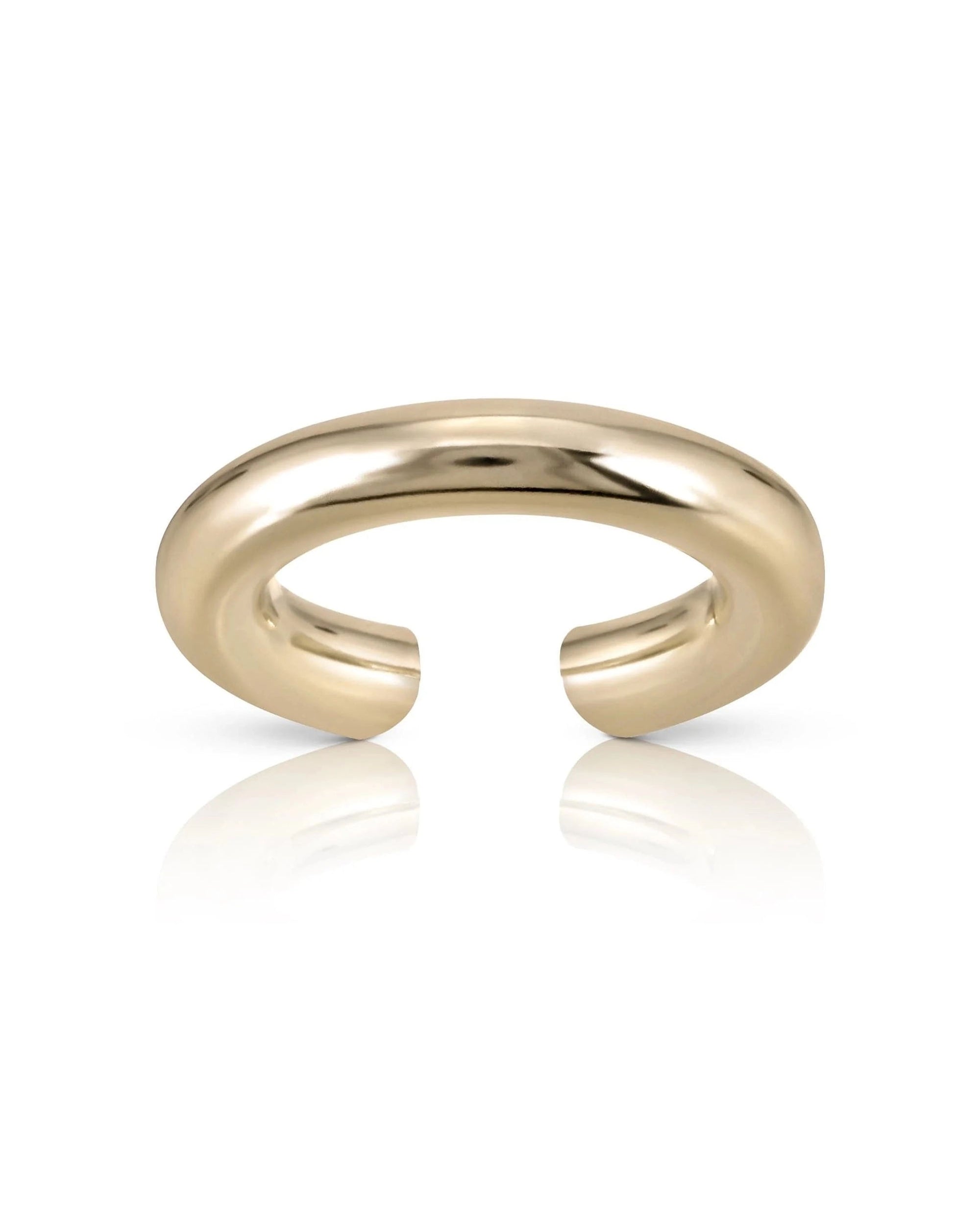 The Lisa Ear Cuff by Faire features a shiny, 10K gold open-ended design with a smooth, thick band for mid-ear cartilage, shown on a white background with a subtle reflection.
