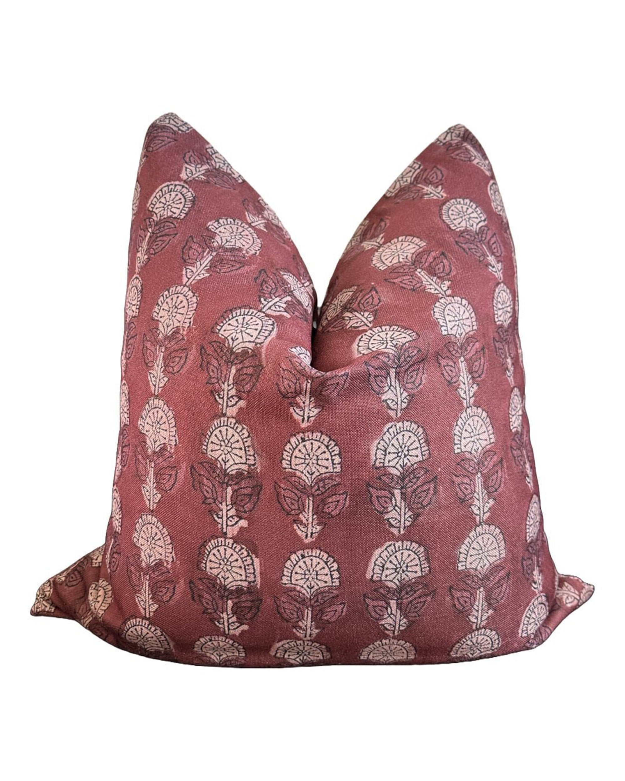 Pink pillow with white floral pattern, 22x22in, by Bungalow Furniture &amp; Accessories, displayed on white background.