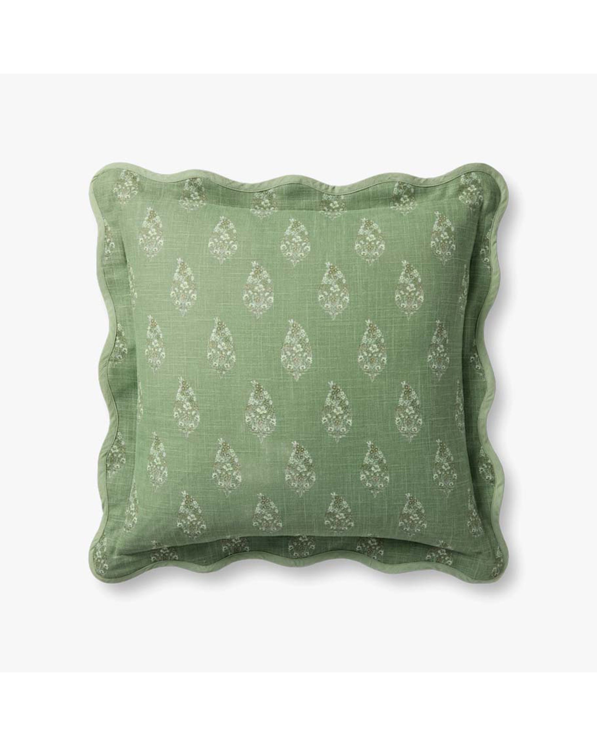 The PRP0070 Green Pillow by Loloi Rugs features light green cotton fabric, a white floral pattern, scalloped edges, and a gold-toned zipper—shown on a white background.