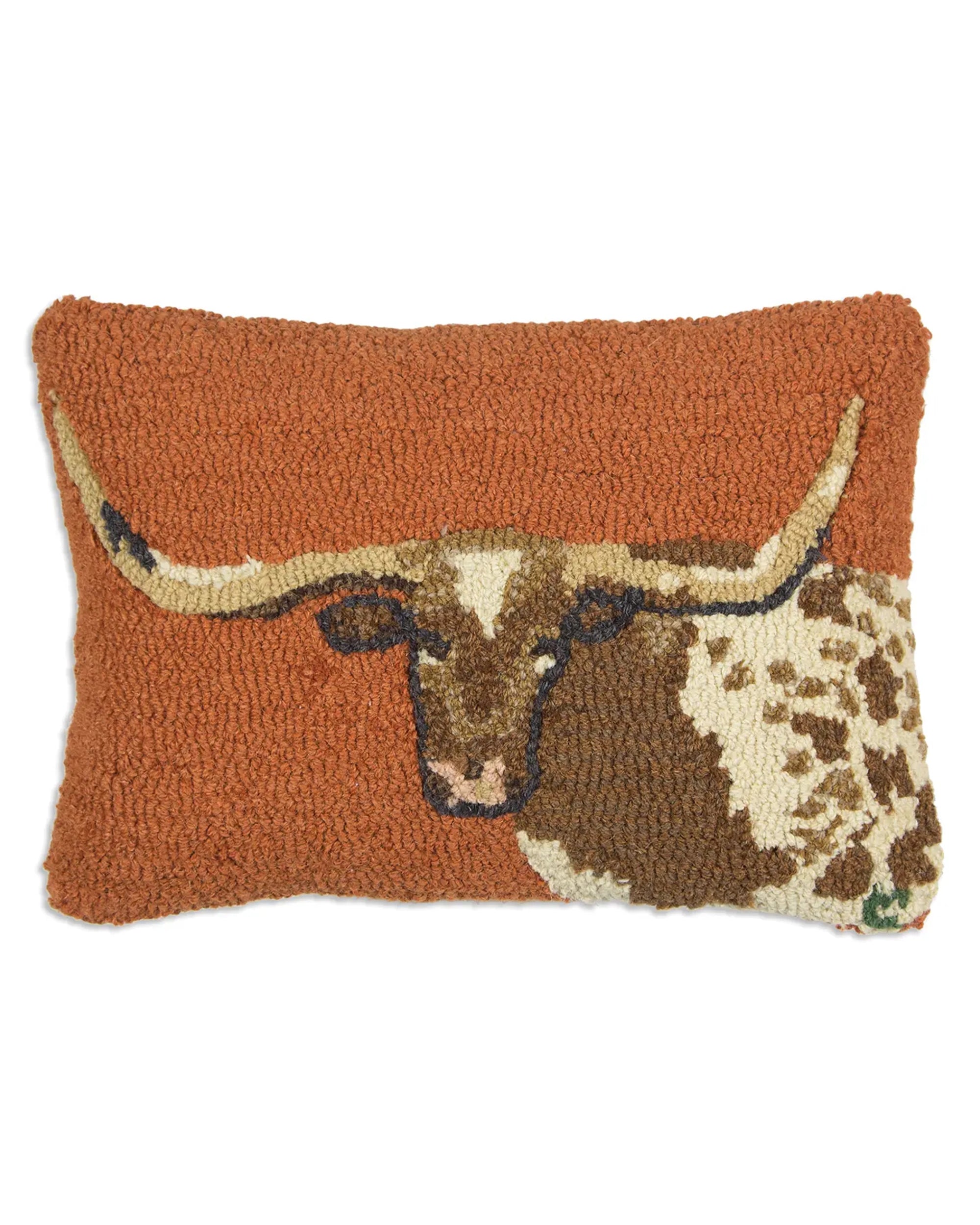 The Faire C4C Long Horn Steer Pillow is a rectangular, rust-colored hand-hooked wool pillow featuring a brown and white longhorn steer with large horns.