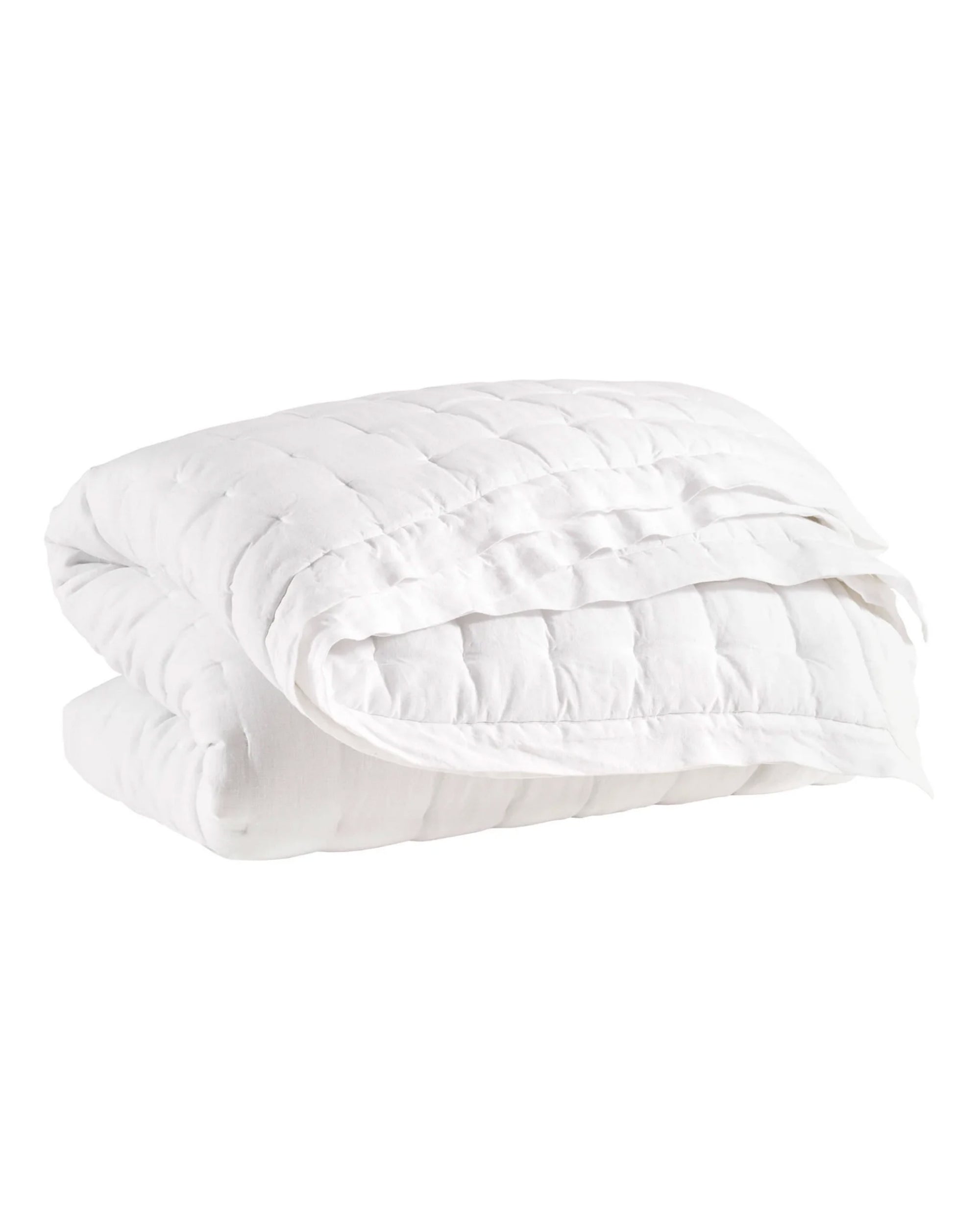 A neatly folded Pinecone Hill Lush Linen Puff Twin blanket with a soft, textured surface is displayed against a plain white background—an inviting bedding solution for any room.