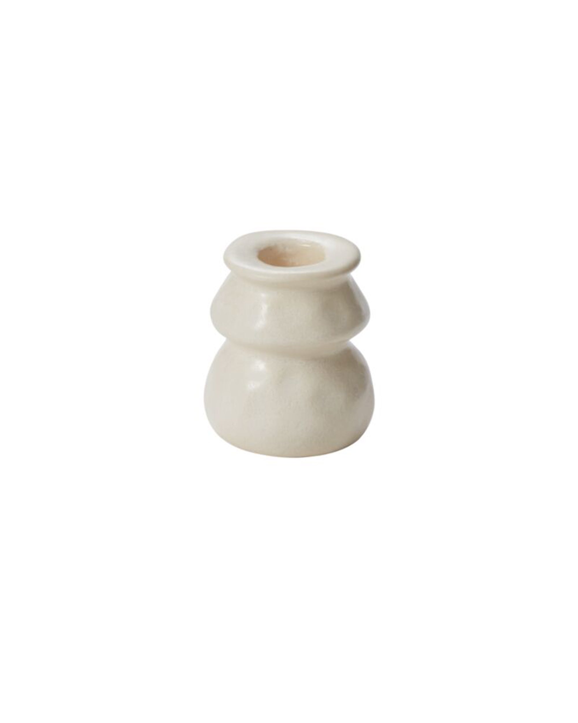 The Lyam Candleholder by Accent Decor is a small, white ceramic piece with a glossy finish and rounded, tiered shape. Featuring a white reactive glaze, it's a charming handmade decor item shown on a plain white background.