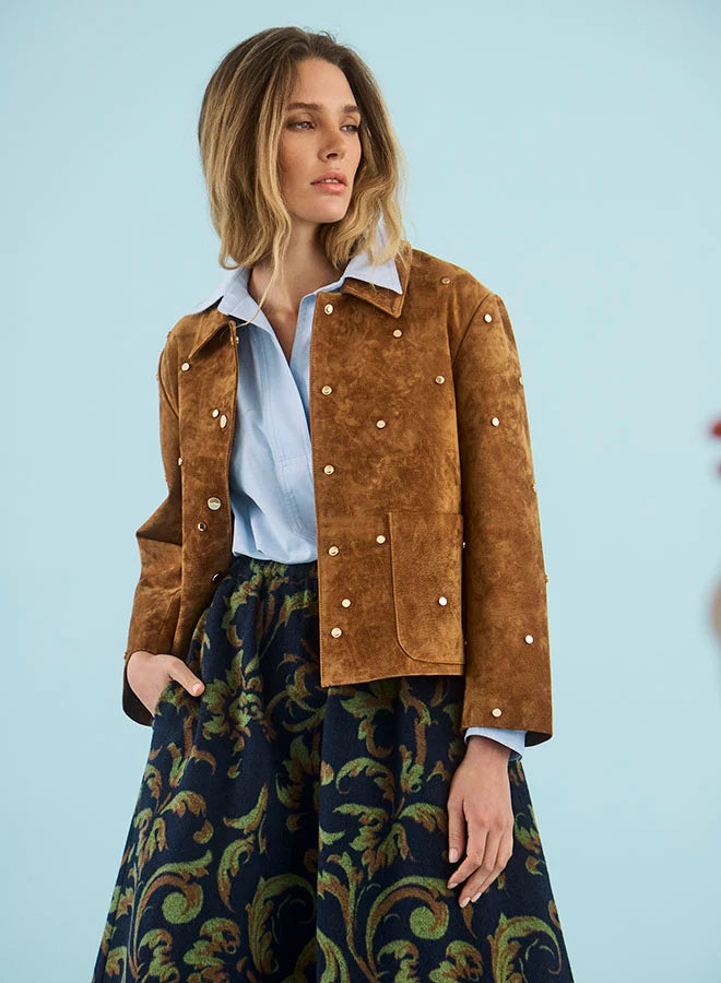 Hanlin Jacket by Hunter Bell NYC in soft blue, styled against a light blue background.