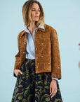 Hanlin Jacket by Hunter Bell NYC in soft blue, styled against a light blue background.