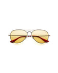Caddis Mabuhay Matte Black aviator sunglasses with yellow-tinted lenses and vibrant red rubber temple tips, shown on a white background.