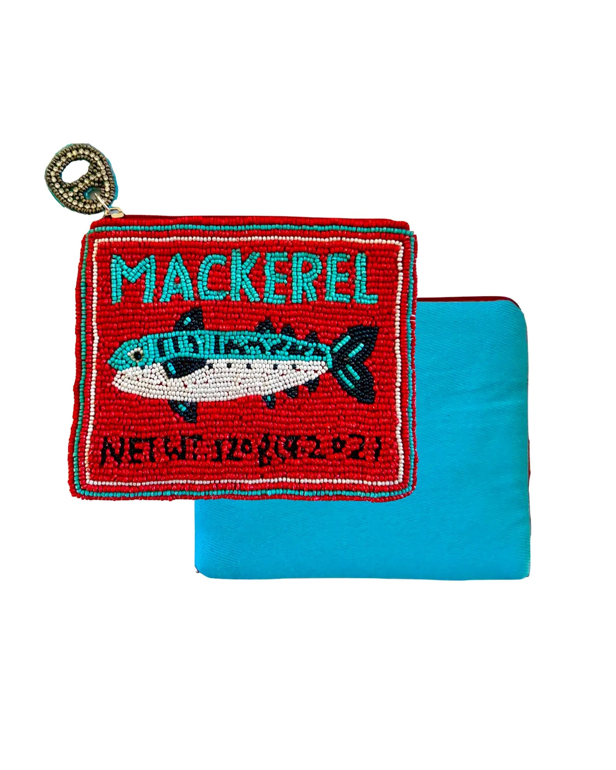 The Beaded Sardine Tin Coin Purse by Faire, featuring a sardine tin design with red accents, is displayed on a folded turquoise cloth.