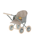 The Maileg Baby Stroller by Maileg features a striped fabric seat, pastel green frame, cream wheels, and handle. Its bead bar with green, yellow, and taupe wooden beads is perfect for playtime with multiple babies.