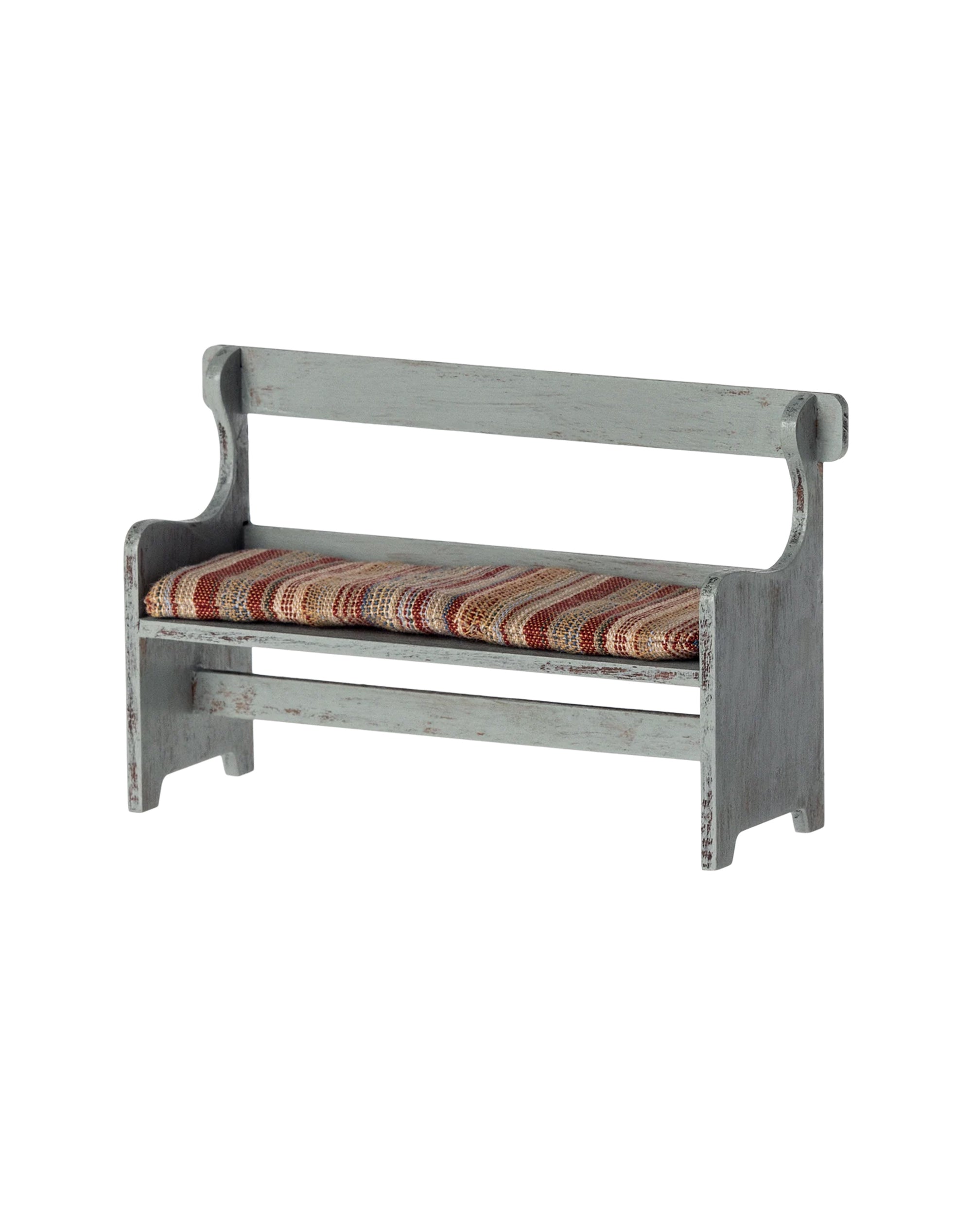 The Maileg Bench by Maileg is a small wooden mouse bench with a distressed gray finish, backrest, and cozy striped multicolored cushioning—perfect for lovers of charming mice furniture.