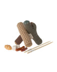 The Maileg Bonfire Set includes three fabric sushi rolls, three plush sushi pieces, and wooden chopsticks—ideal for Maileg mouse camping adventures or pairing with hiking mouse dolls.