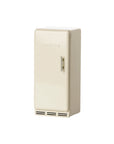 The Maileg Fridge by Maileg is a small, cream-colored, old-fashioned fridge with an embossed logo and single handle, ideal for the Maileg Mouse hole Farmhouse and shown against a white background.