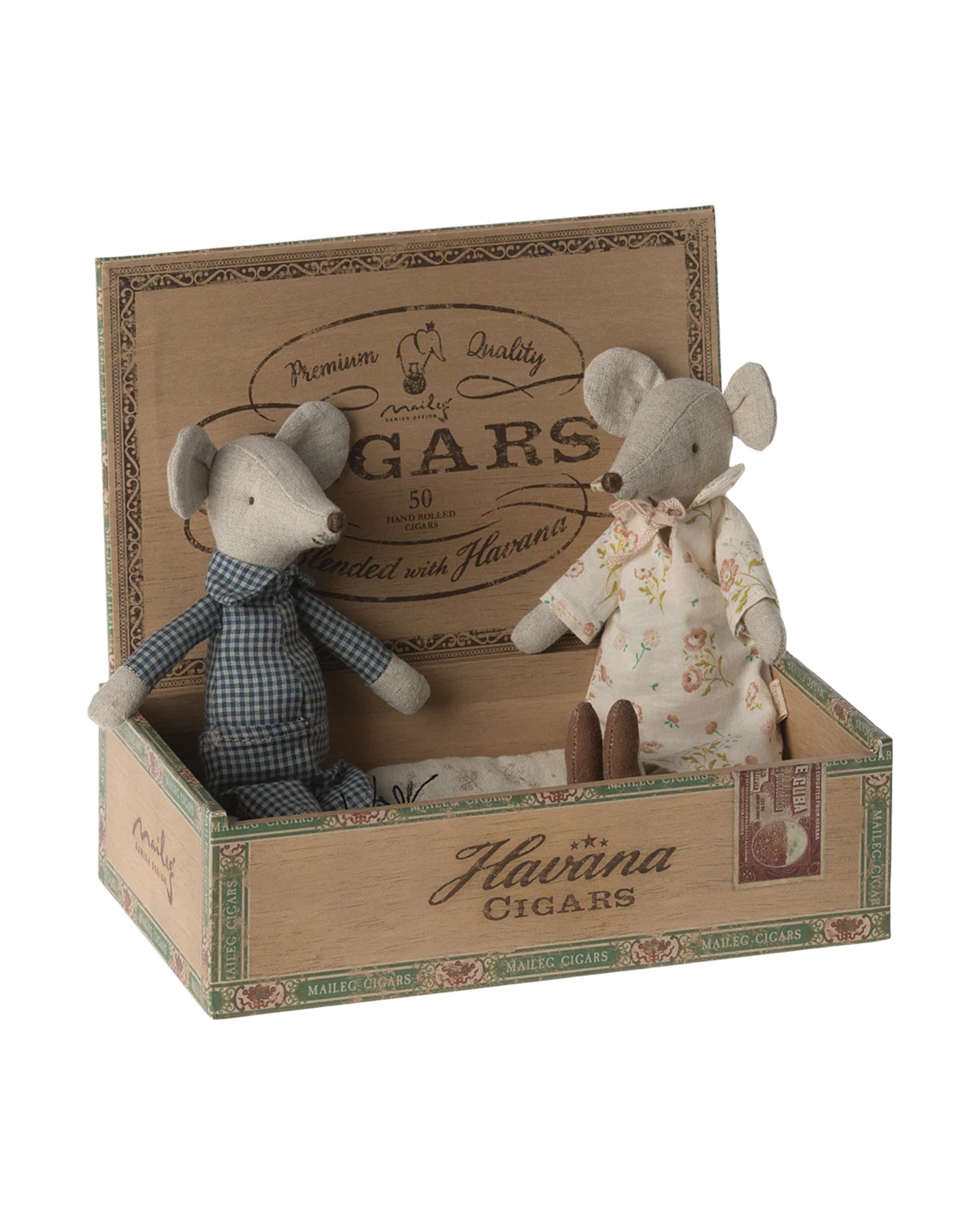 Maileg Grandma & Grandpa Mice by Maileg are two fabric dolls in patterned outfits, seated in an open vintage-style wooden cigar box labeled "Havanna Cigars," featuring printed designs and a hinged lid.