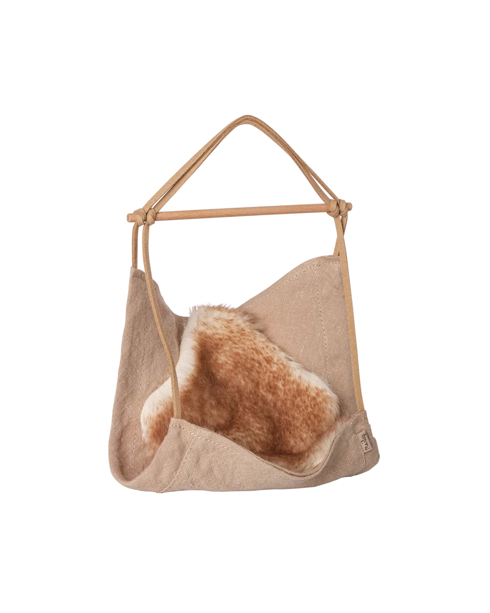 The Maileg Hanging Chair by Maileg, crafted with beige suede, a tan fur flap, wooden handles, and knotted leather straps, evokes the charming detail of delicate dollhouse furniture when displayed against a white background.