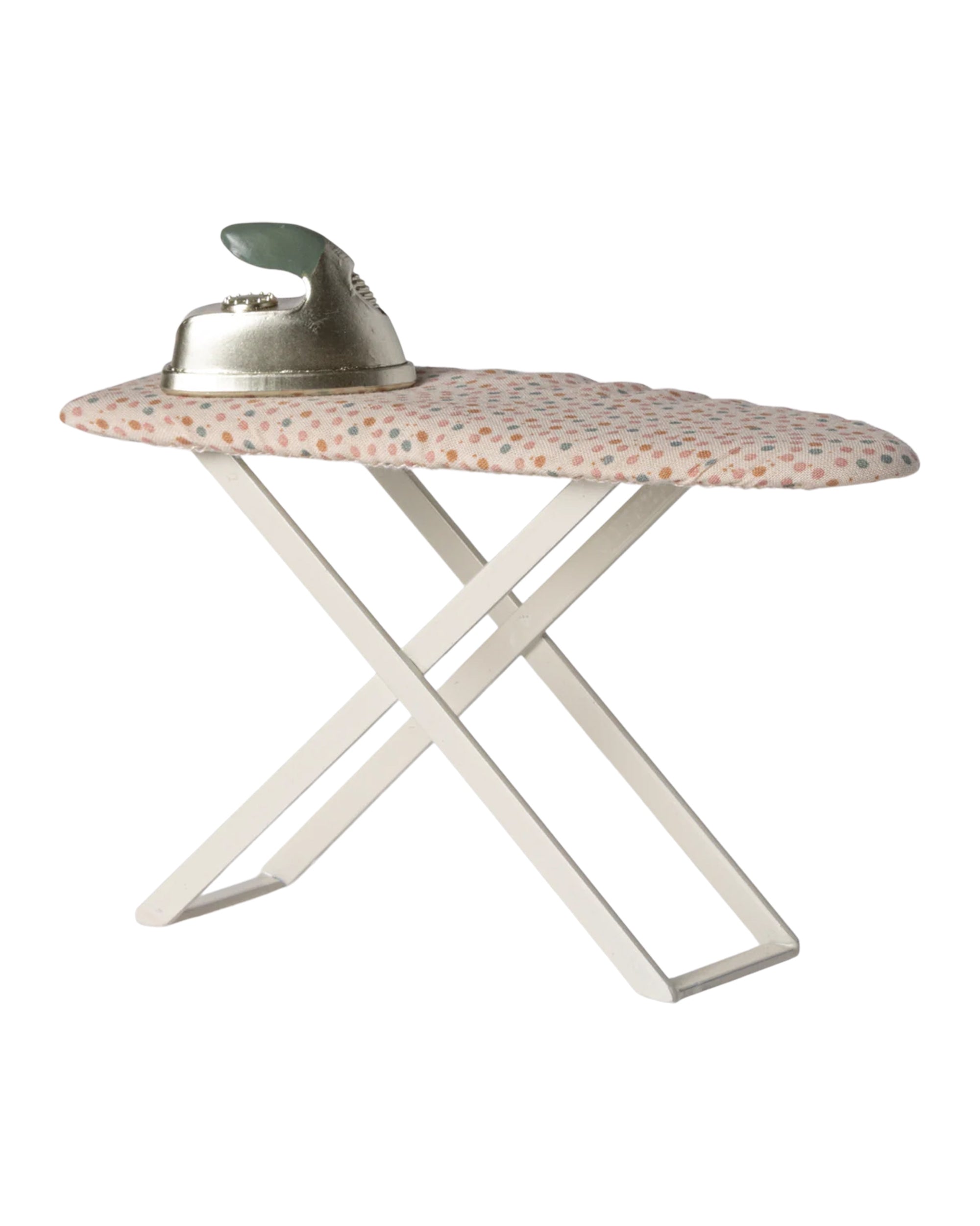 The Maileg Iron and Ironing Board features a padded, polka-dotted cover and metallic iron, all designed as charming miniatures by Maileg, perfect for the mouse family.