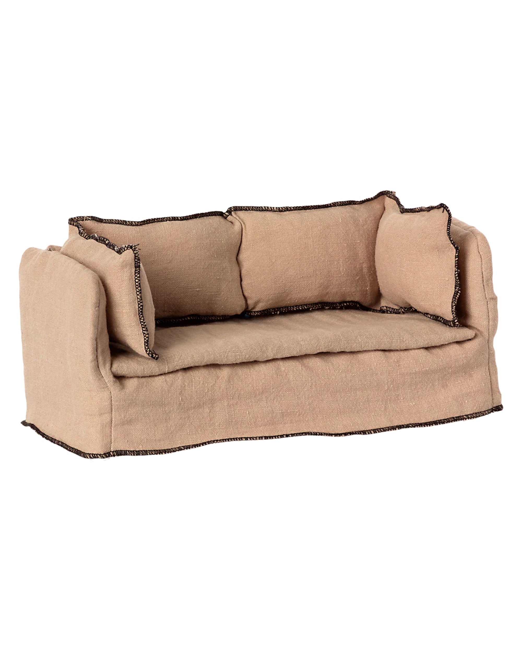The Maileg Couch, Miniature by Maileg is a small tan fabric sofa with two seat cushions, three back cushions, and dark trim—ideal as dollhouse furniture or a charming accent for your miniature collection.