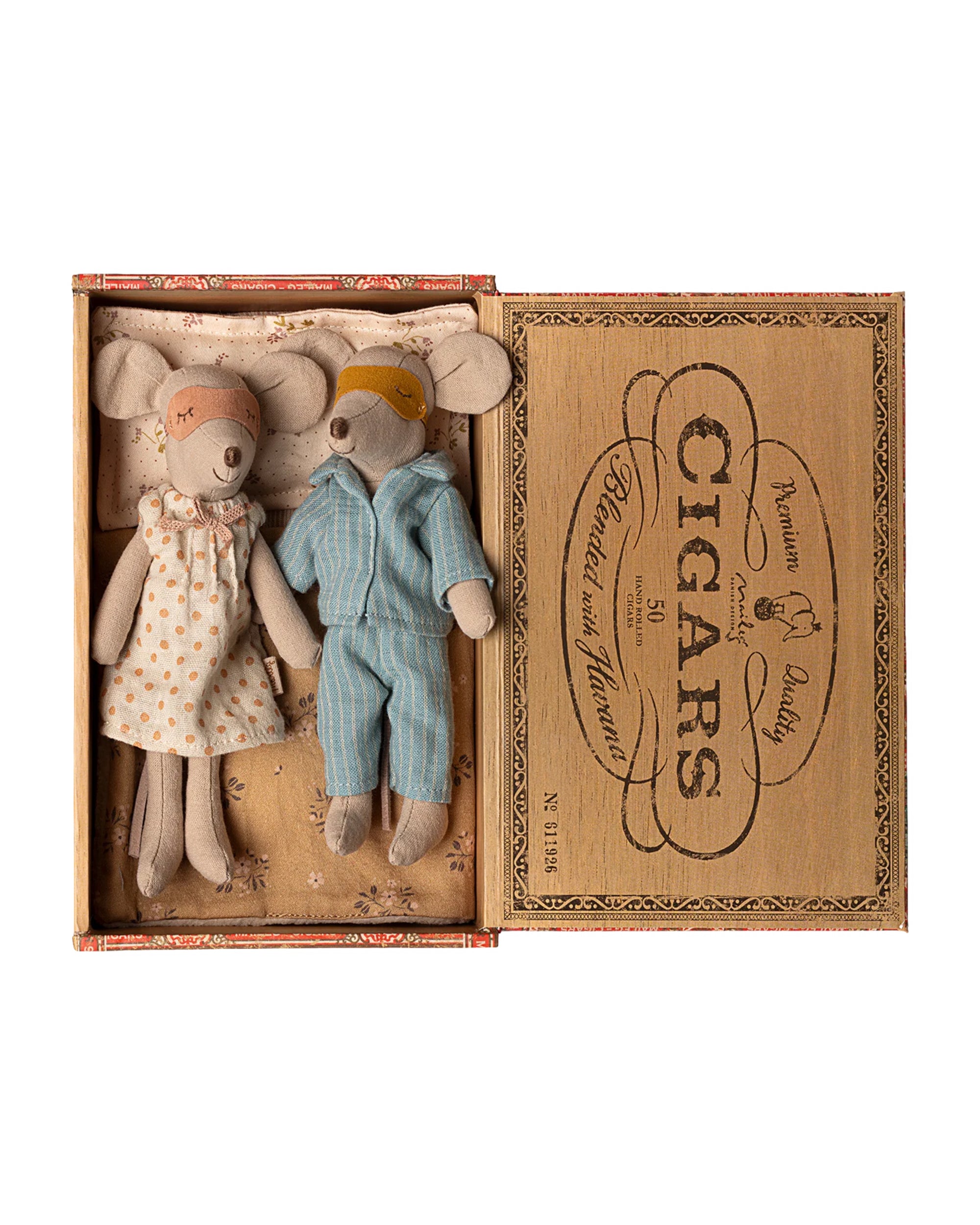 Maileg Mum &amp; Dad Mice by Maileg come in a vintage-style "CIGARS" box bed. Dressed in pajamas and sleep masks, Mum wears a white dress with orange dots, Dad wears blue striped pajamas.