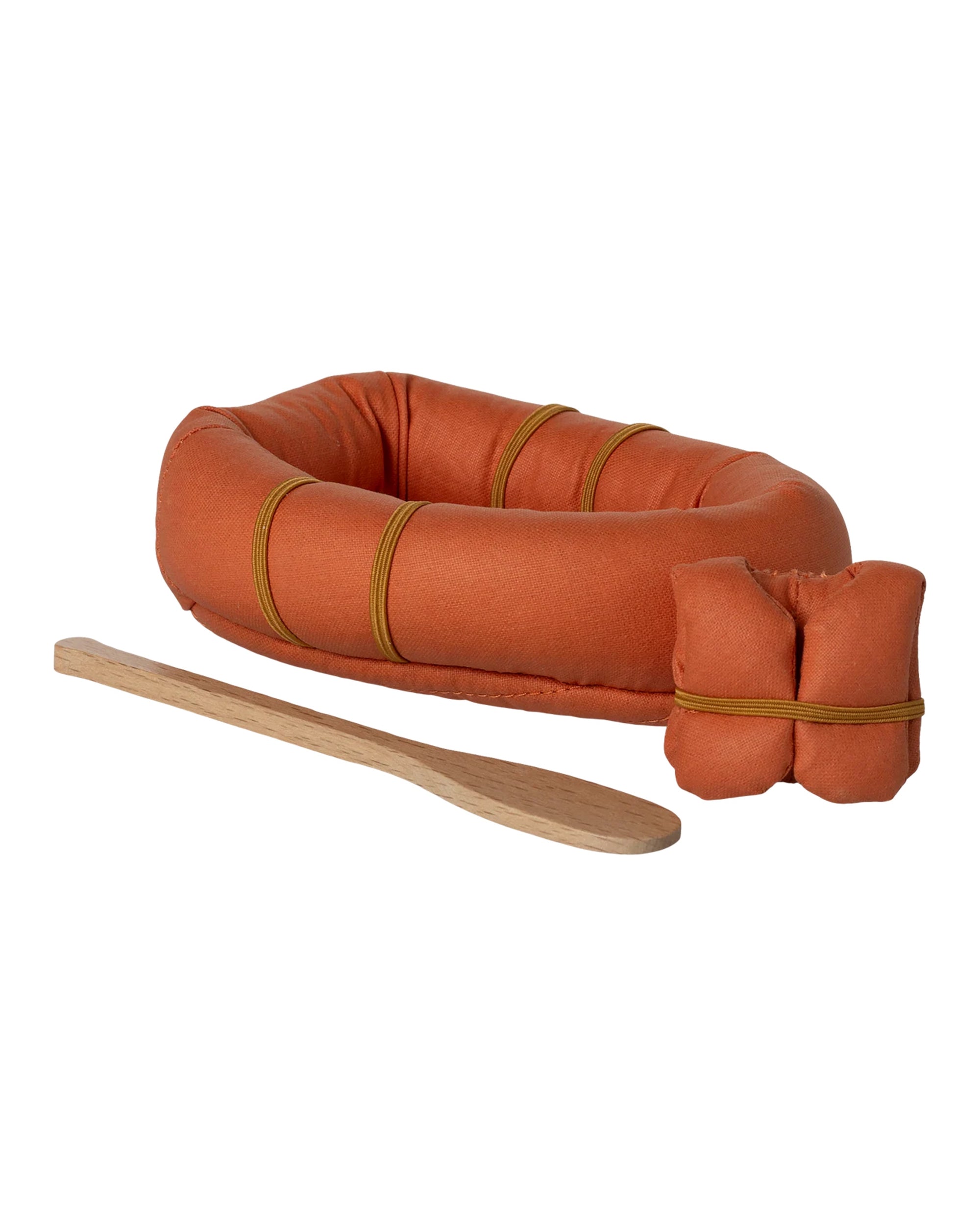 The Maileg Rubber Boat features a small orange design with yellow bands, a matching rolled-up bundle, and a wooden paddle—ideal for adventurous hiker mice and photographed on a white background.