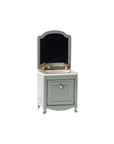 The Maileg Sink Dresser by Maileg features a vintage-style vanity with mirror, gold faucet, and white sink on a green cabinet with a gold knob—ideal for any Mouse hole Farmhouse. Set against a plain white background.