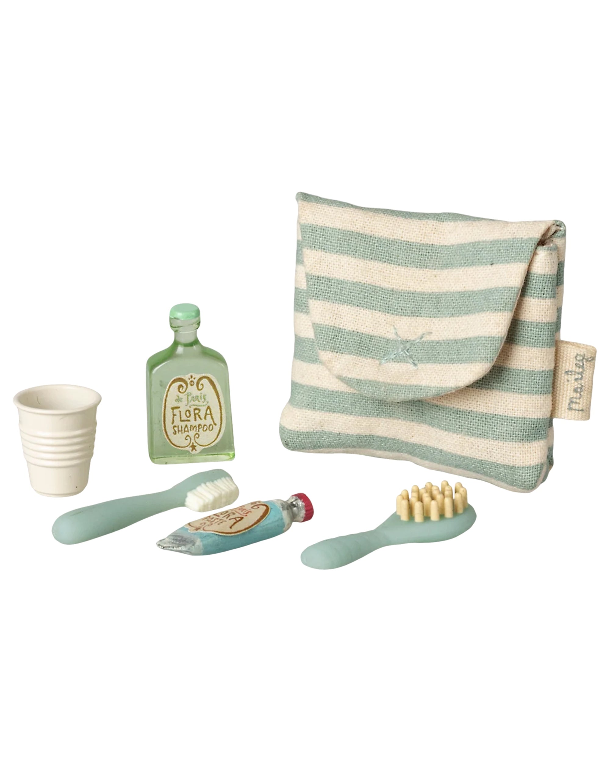 Striped pouch with cup, toothbrush, toothpaste, and shampoo from Maileg Toothbrush Set, ideal for kids’ bathroom accessories.