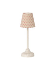 The Maileg Vintage Floor Lamp by Maileg features a small white base and a fabric lampshade with red polka dots, shown against a plain white background.