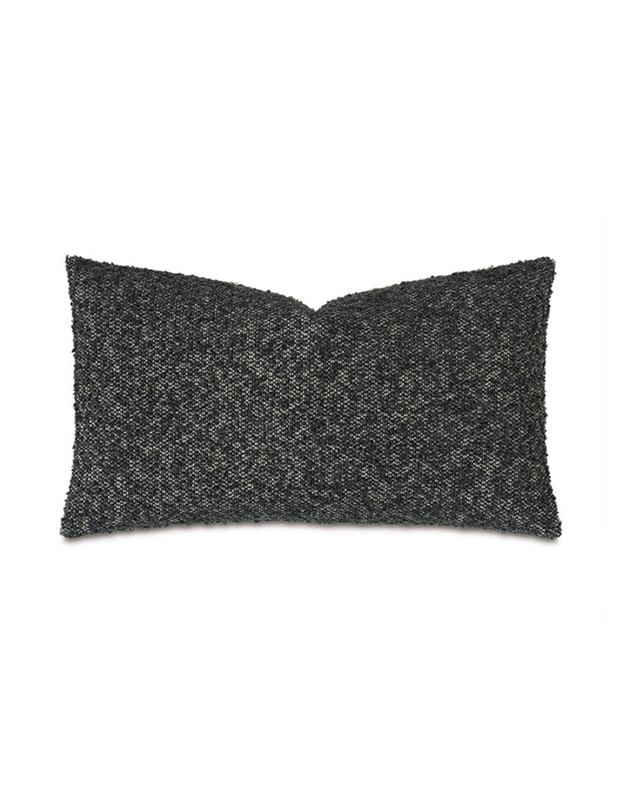 The Marl Deco Charcoal pillow by Eastern Accents is a rectangular, dark grey decorative piece with a subtle speckled pattern, crafted from soft boucle fiber and displayed against a white background.