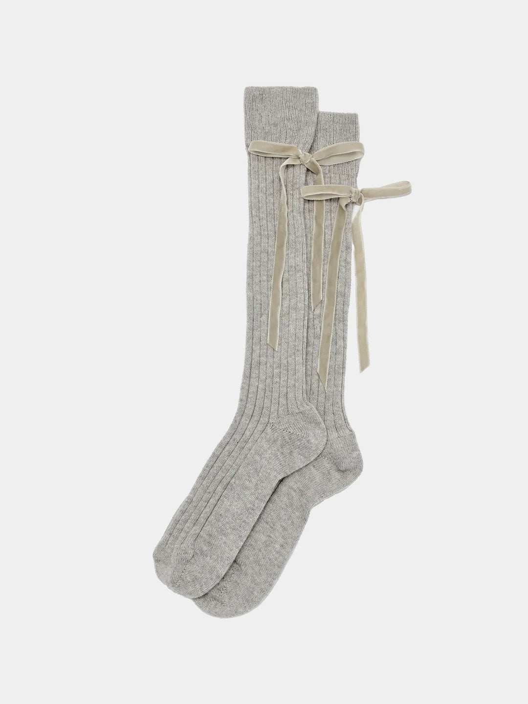 The Maria La Rosa College Velvet Bow Sock features long, light gray ribbed socks with beige velvet ribbon bows at the upper cuffs, shown on a plain white background.