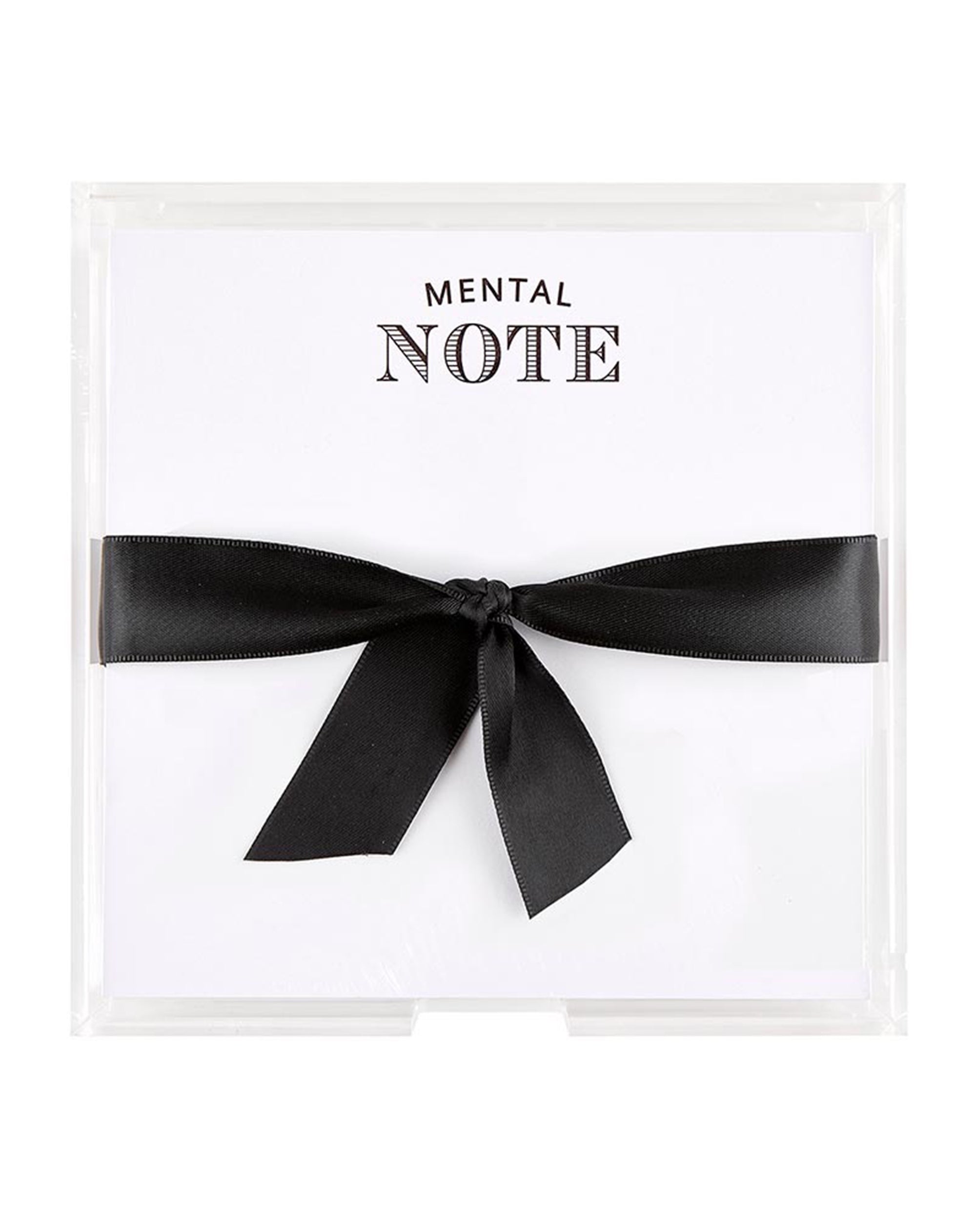 The Square Notepaper in Acrylic Tray by Faire features white sheets labeled "MENTAL NOTE," wrapped in a black satin ribbon and arranged in a clear acrylic holder—an elegant touch for any workspace and ideal for organizing acrylic stationery.