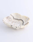 Yellow and white onyx bowl with wavy edge, marbled cream and gray, Faire, decorative accent for living room or dining.