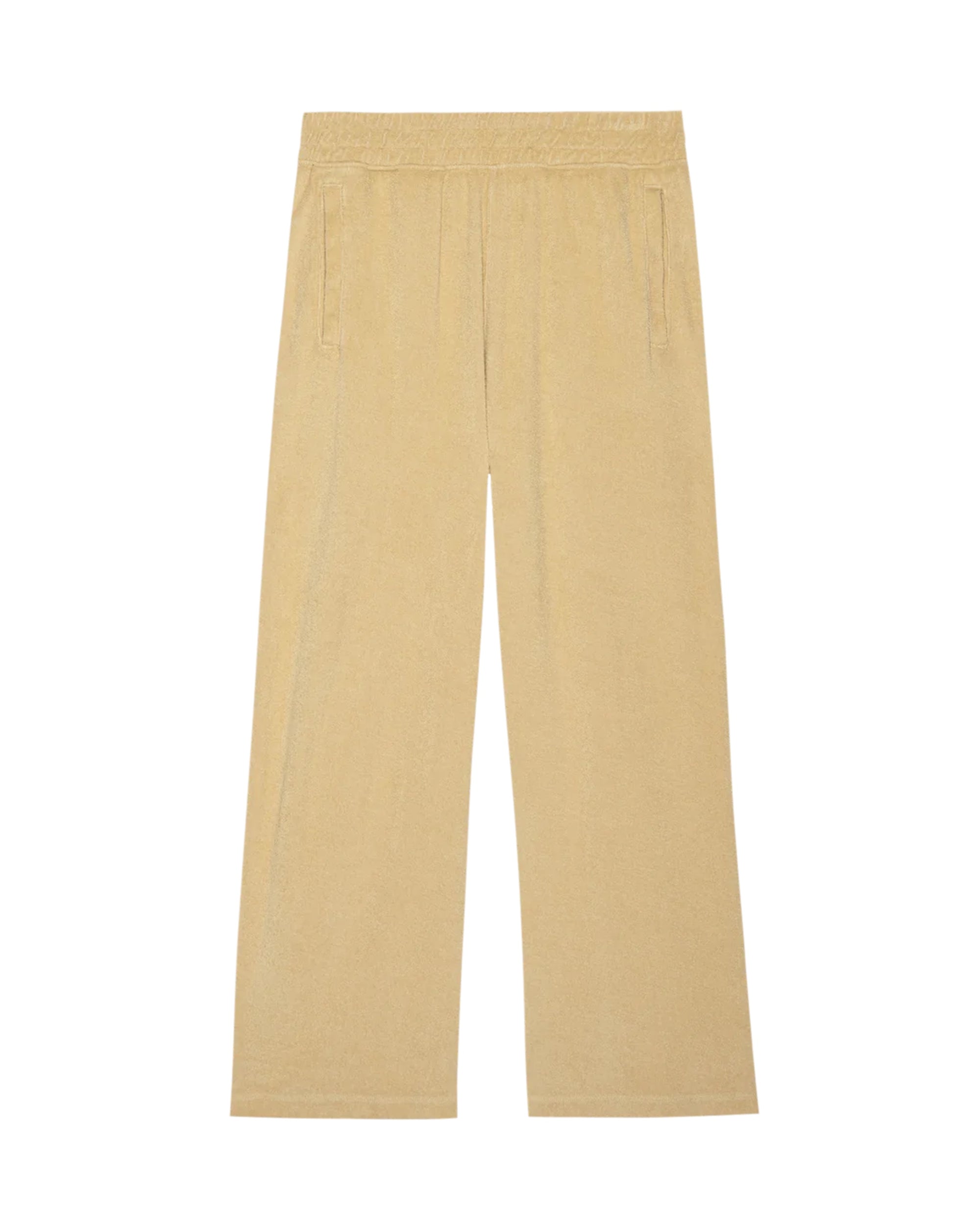 The Micro Terry Sweatpant by The Great Inc. is a light beige, wide-leg style with an elastic waistband and side pockets. Made from soft cotton micro terry, these sweatpants are perfect for casual wear. Shown laid flat on a white background.