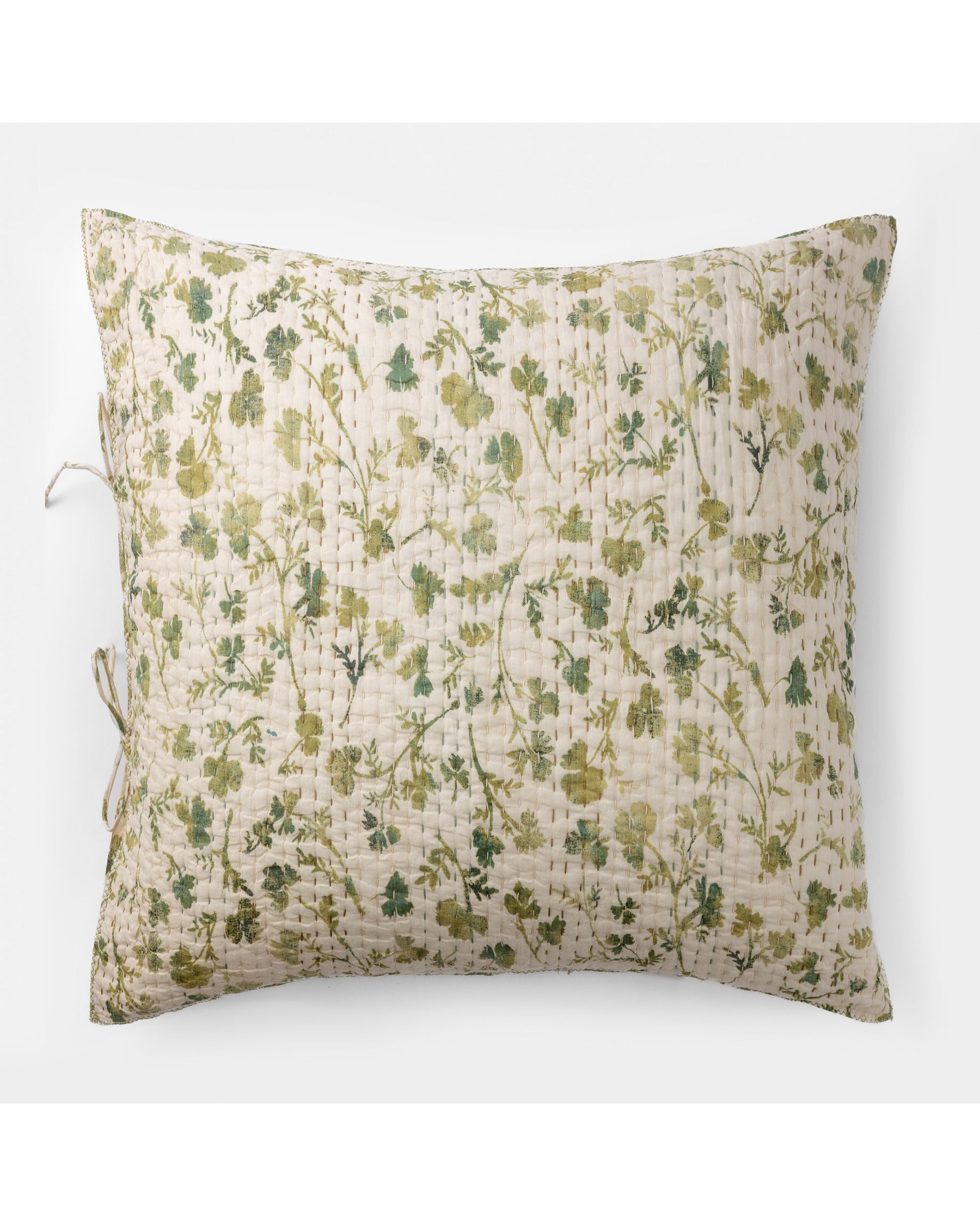 The Millie Euro Sham by Amity Home features a quilted rectangular design with a green and beige floral pattern on cotton voile and a solar print-inspired foliage motif on a light background.