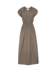 The BROCHU WALKER MINA DRESS is a taupe short-sleeve dress featuring a smocked waist and gathered shoulder detailing, shown against a plain white background.