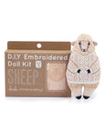 Faire Sheep Embroidery Kit: DIY set to create a plush sheep in a detailed, knitted-style sweater. Comes in a box with an illustrated sheep design and includes a level 3 sheep embroidery pattern for creative fun.