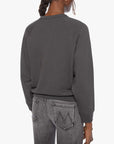 Back view of The Concert shrunken raglan sweatshirt and faded black Mother jeans in black on white background.